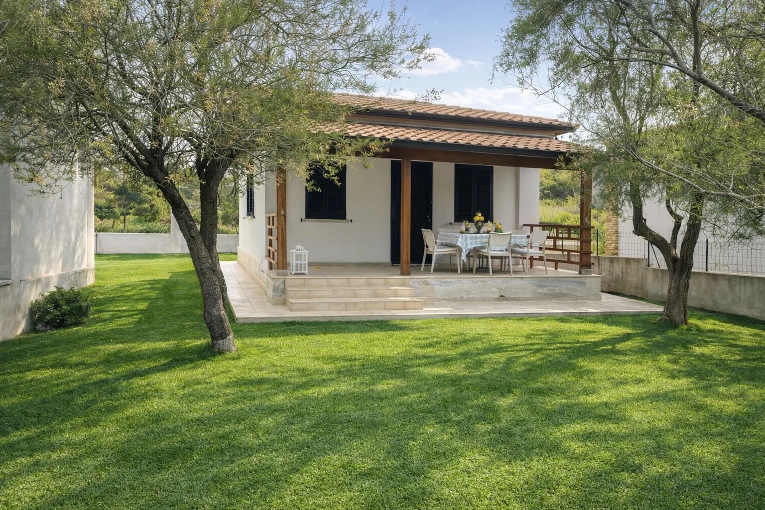 Giardino e veranda · Armenes, Capopiccolo